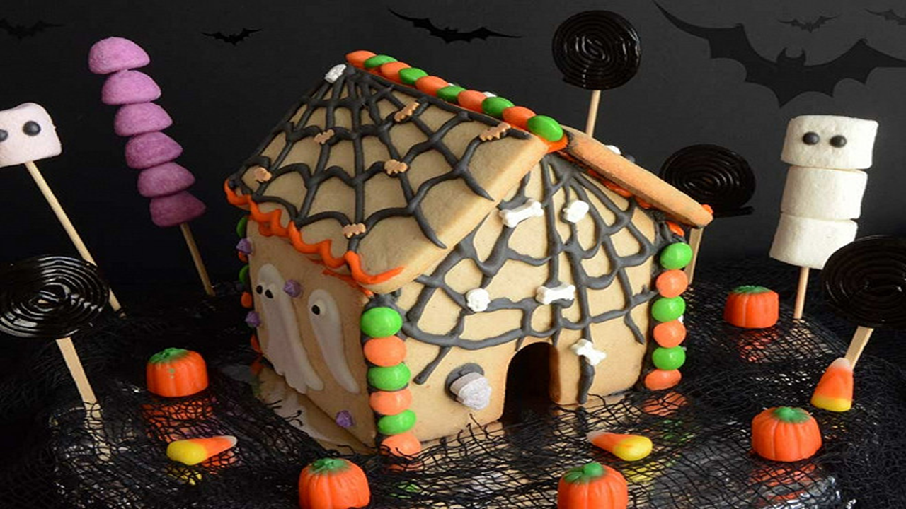 Image d'un gâteau "Maison hantée Halloween" réalisé lors d'un atelier de cours de pâtisserie dispensé par Le Fouet Enchanté.