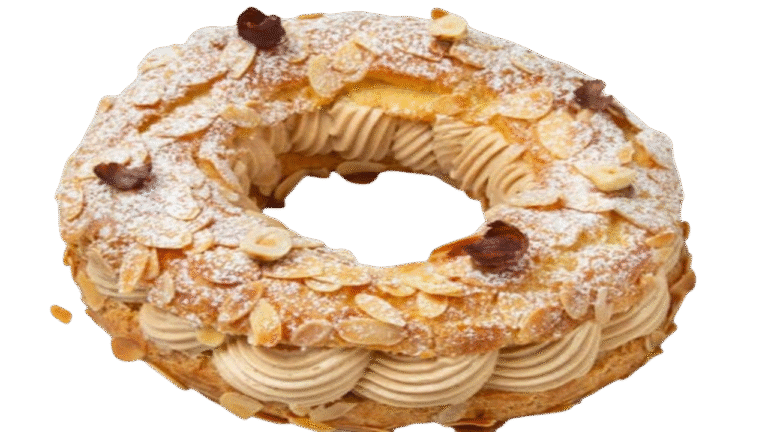 Image d'un gâteau Paris-Brest réalisé lors d'un atelier de cours de pâtisserie dispensé par Le Fouet Enchanté.
