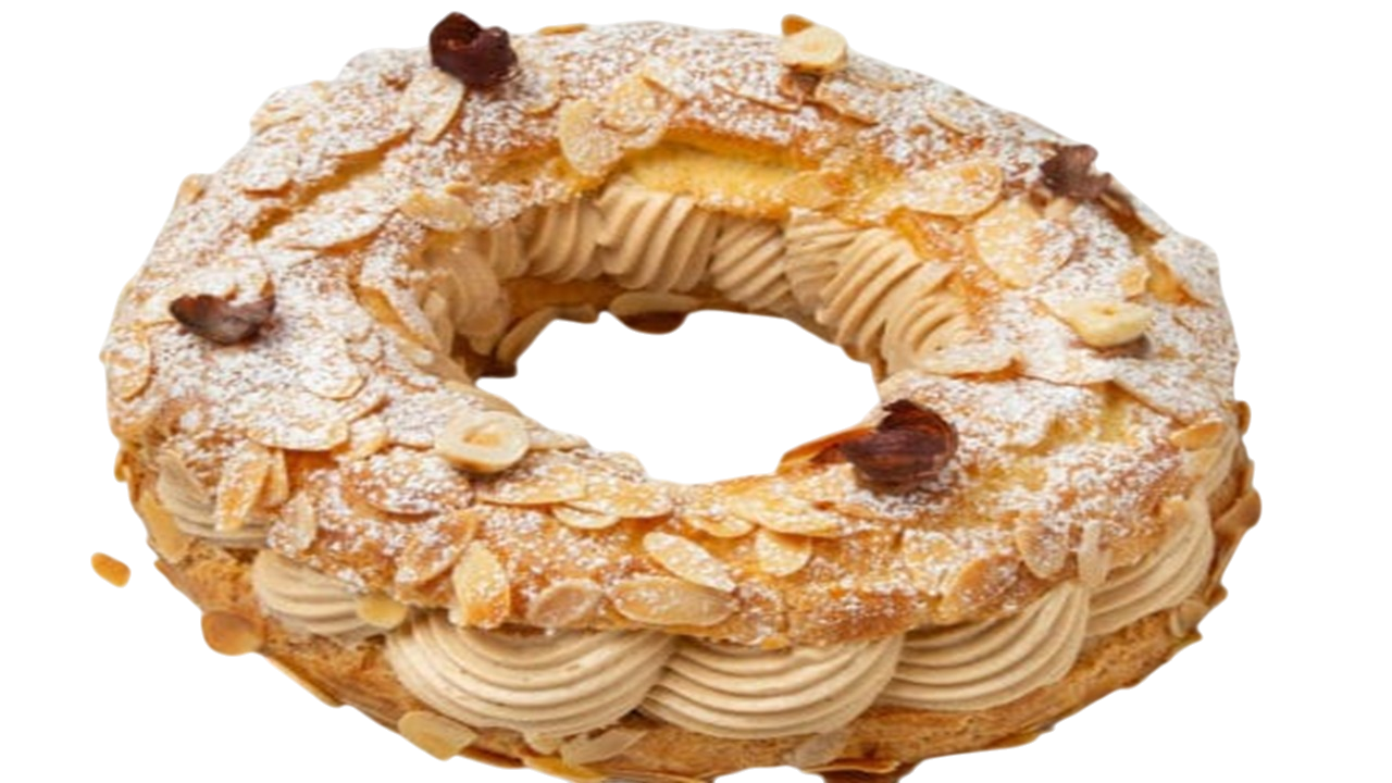 Image d'un gâteau Paris-Brest réalisé lors d'un atelier de cours de pâtisserie dispensé par Le Fouet Enchanté.
